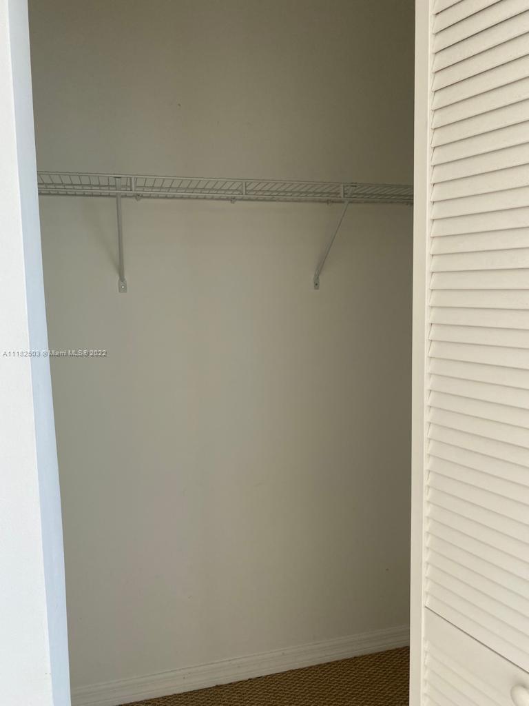 950 Brickell Bay Drive, Unit 602 Miami, FL 33131 - Photo 11 of 16 a close up of a shower