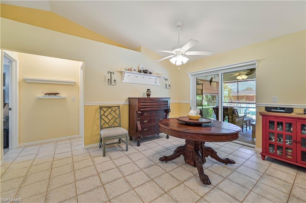 18546 Violet Road Fort Myers, FL 33967 - Photo 17 of 38 a view of a workspace with furniture and a window