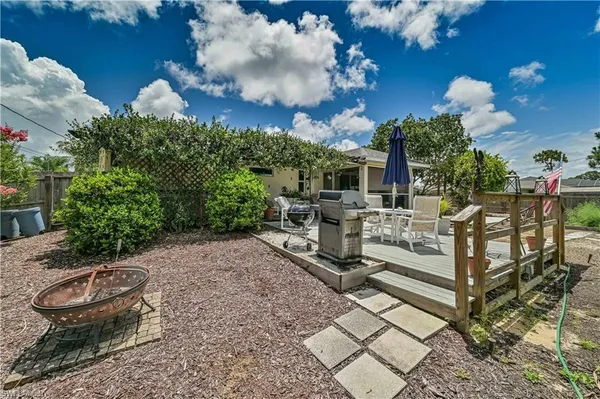 a view of a chairs and tables in the patio