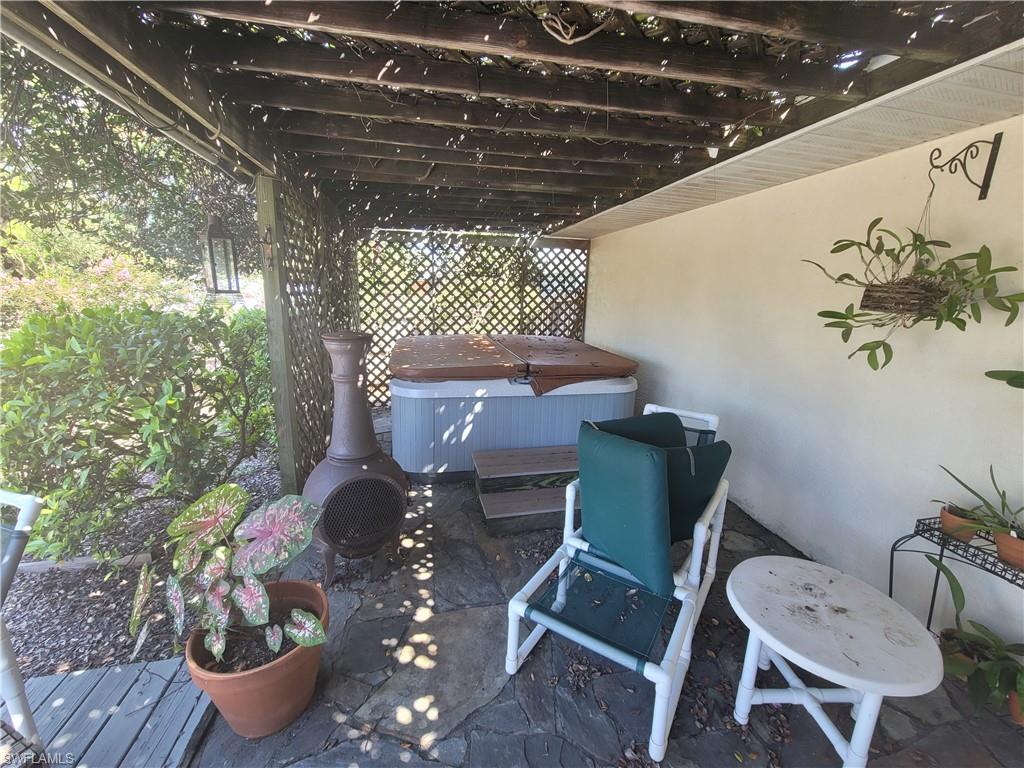 18546 Violet Road Fort Myers, FL 33967 - Photo 32 of 38 a room with furniture and a potted plant