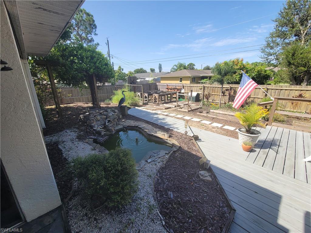 18546 Violet Road Fort Myers, FL 33967 - Photo 34 of 38 a view of a swimming pool with a patio