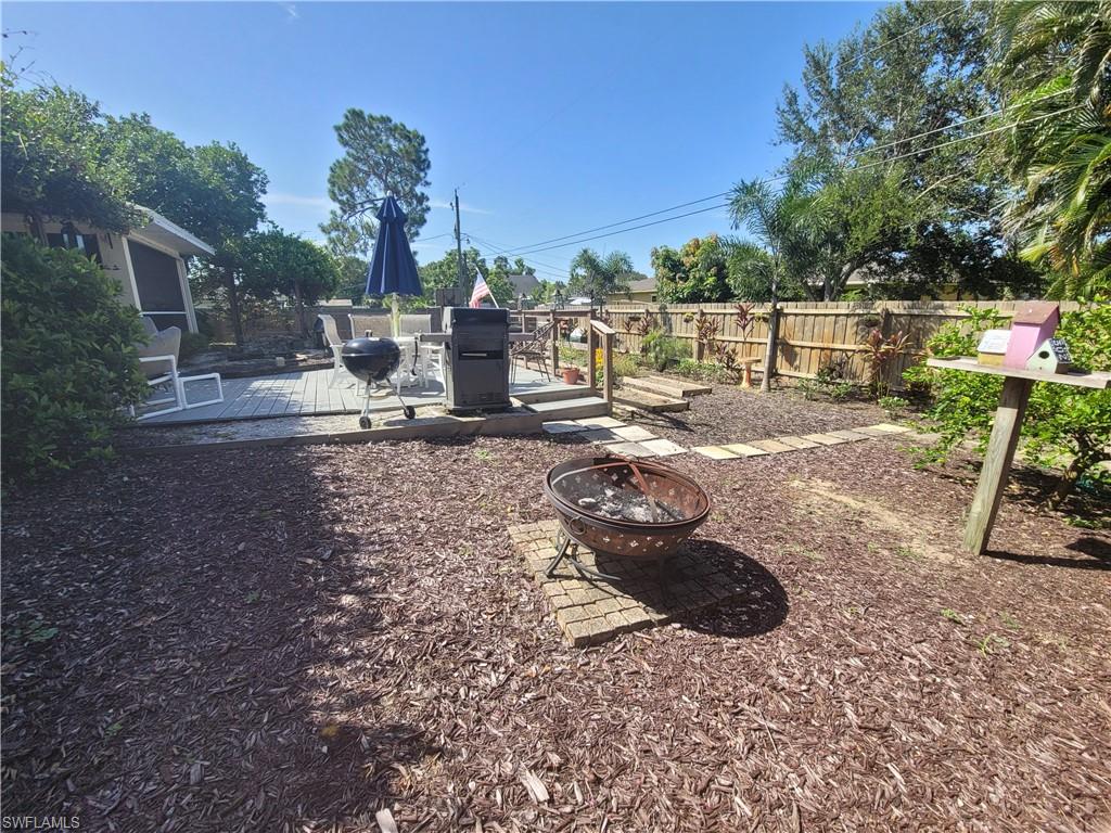 18546 Violet Road Fort Myers, FL 33967 - Photo 36 of 38 a view of a backyard with sitting area