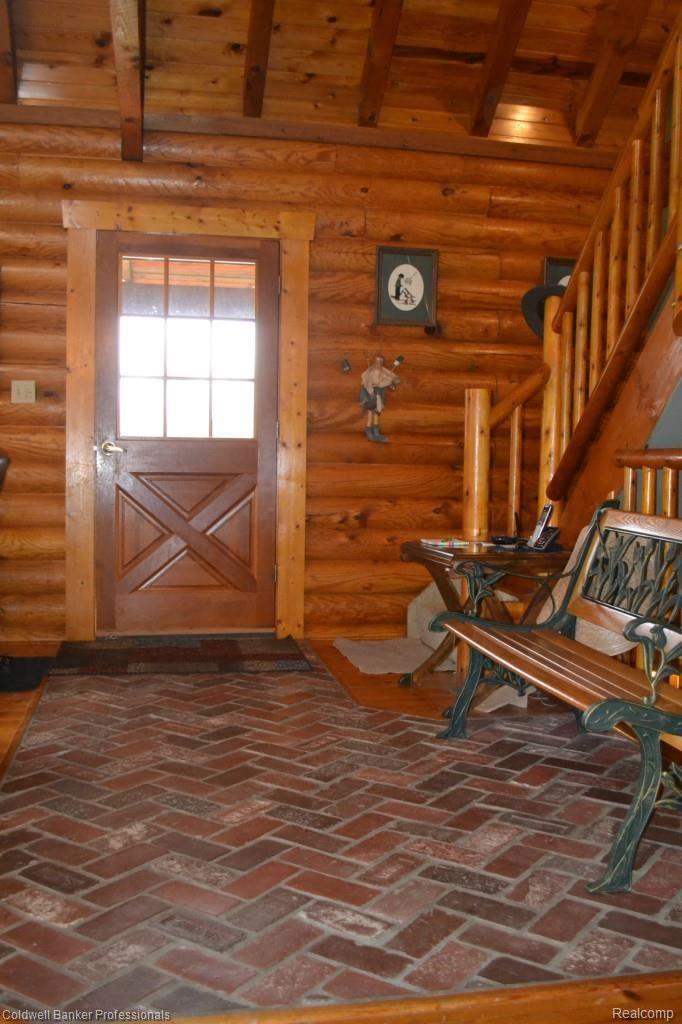 4739 Skelton Road Columbiaville, MI 48421 - Photo 12 of 36 Welcome Home! Entry with bricks is spectacular!