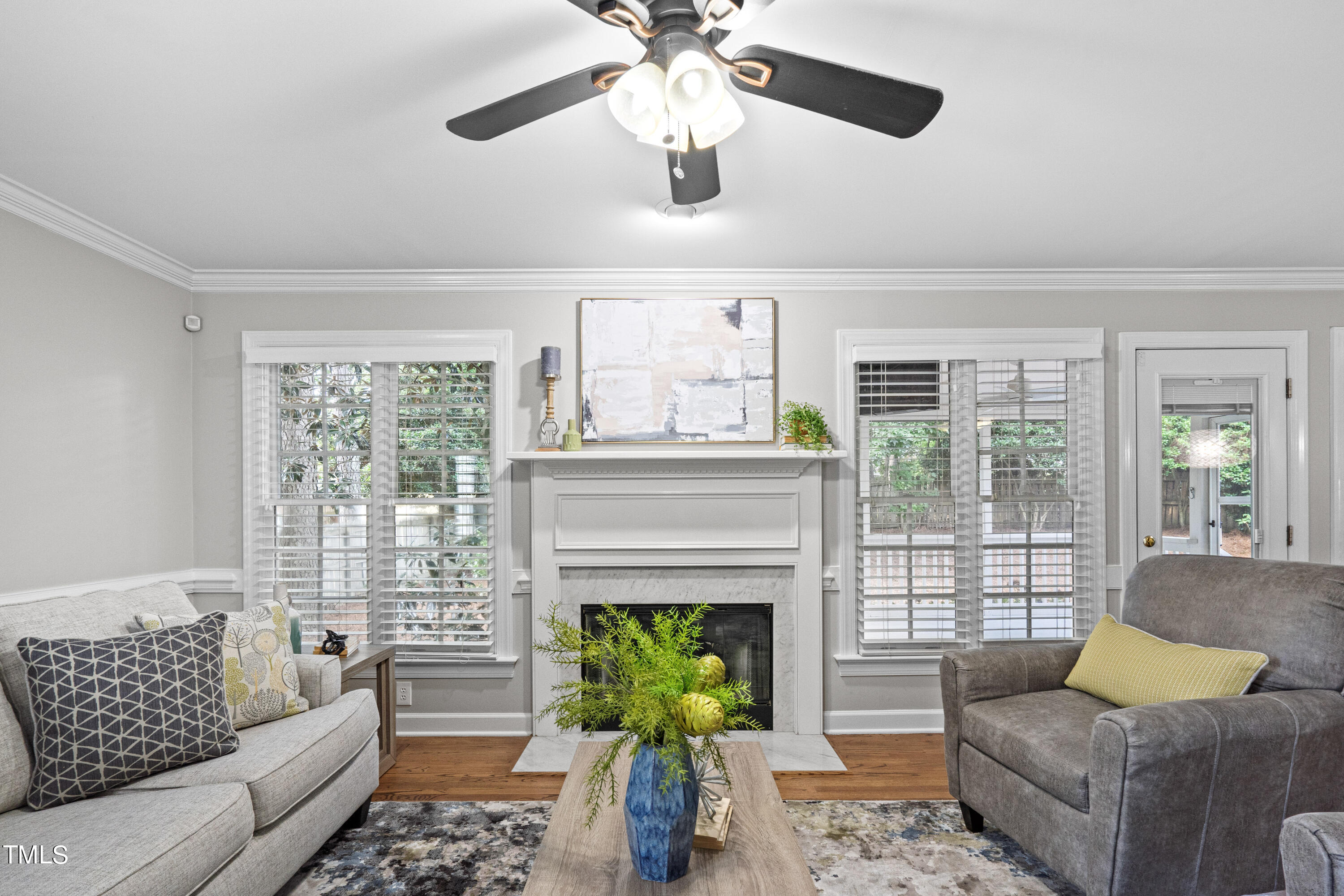 2917 Dahlgreen Road Raleigh, NC 27615 - Photo 14 of 36 a living room with furniture and a fireplace