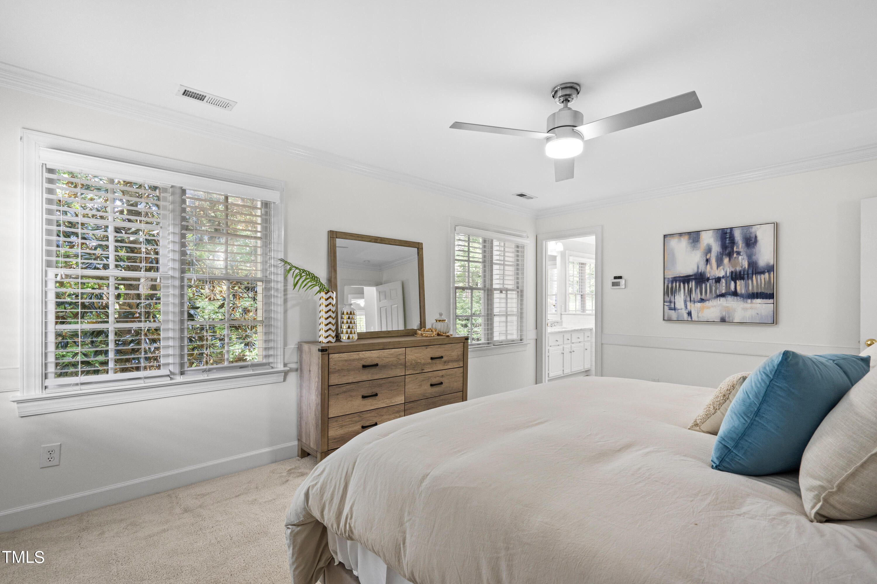 2917 Dahlgreen Road Raleigh, NC 27615 - Photo 16 of 36 a bedroom with a large bed and a window