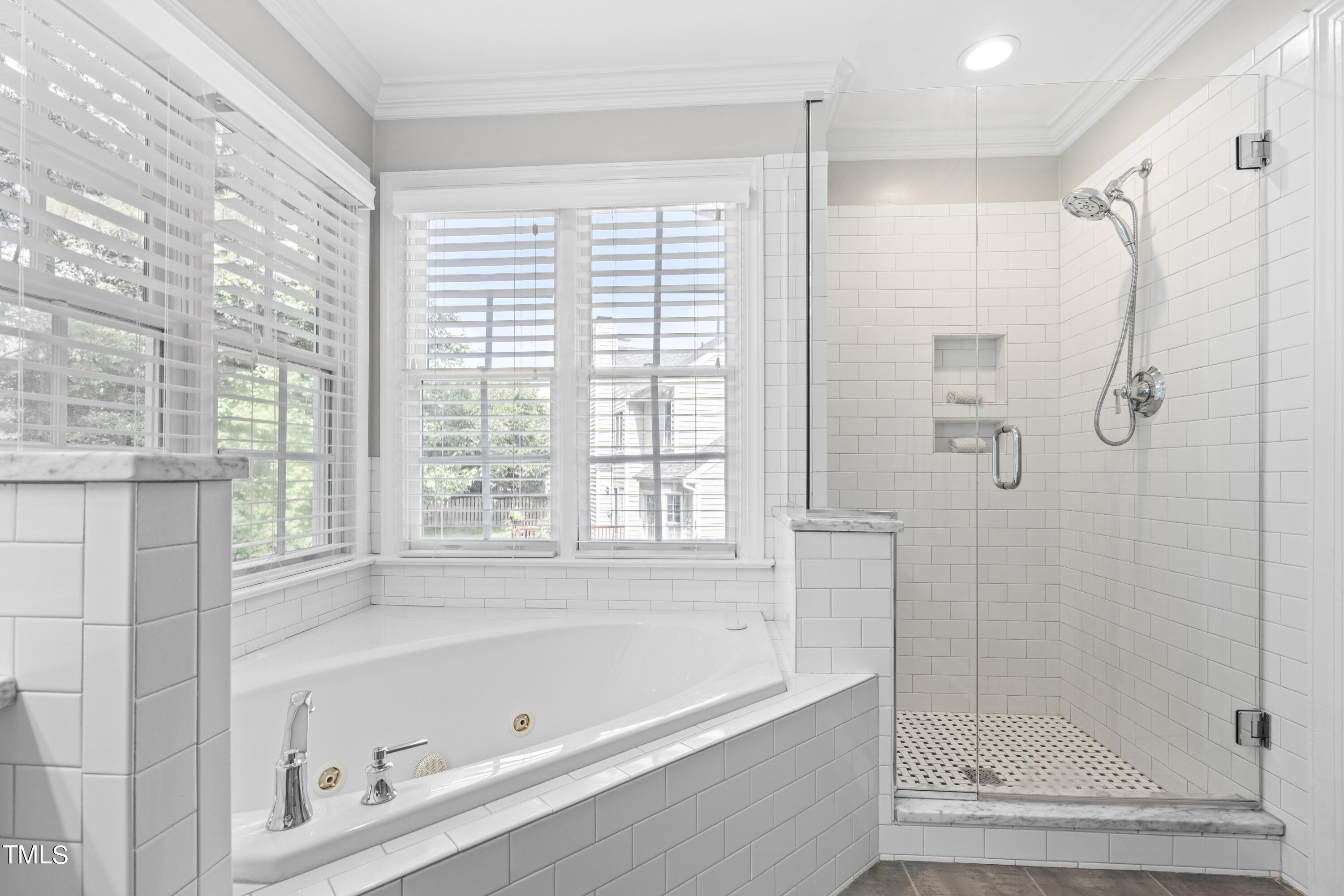 2917 Dahlgreen Road Raleigh, NC 27615 - Photo 20 of 36 a bathroom with a bathtub and a shower