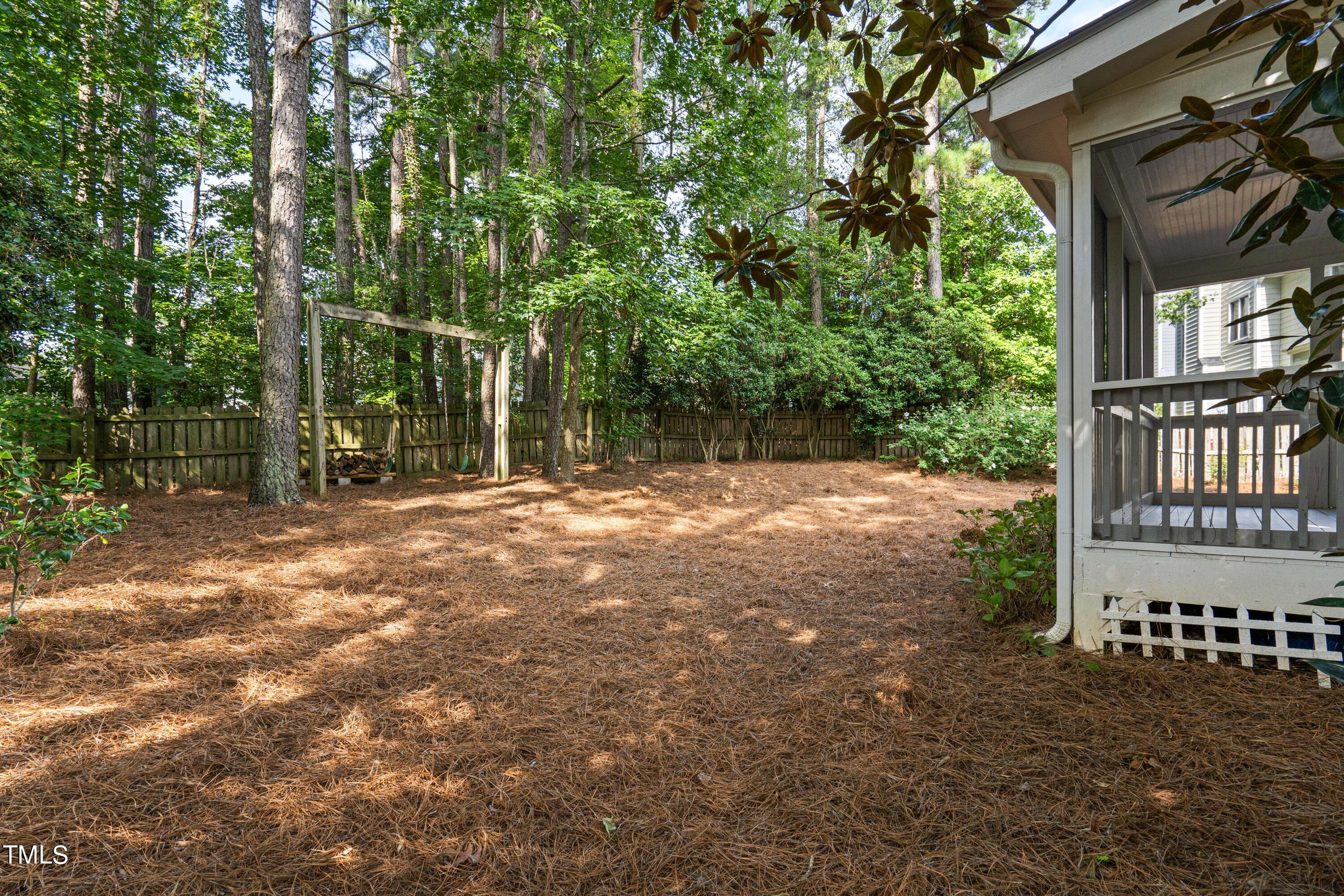 2917 Dahlgreen Road Raleigh, NC 27615 - Photo 34 of 36 a backyard of a house with lots of green space