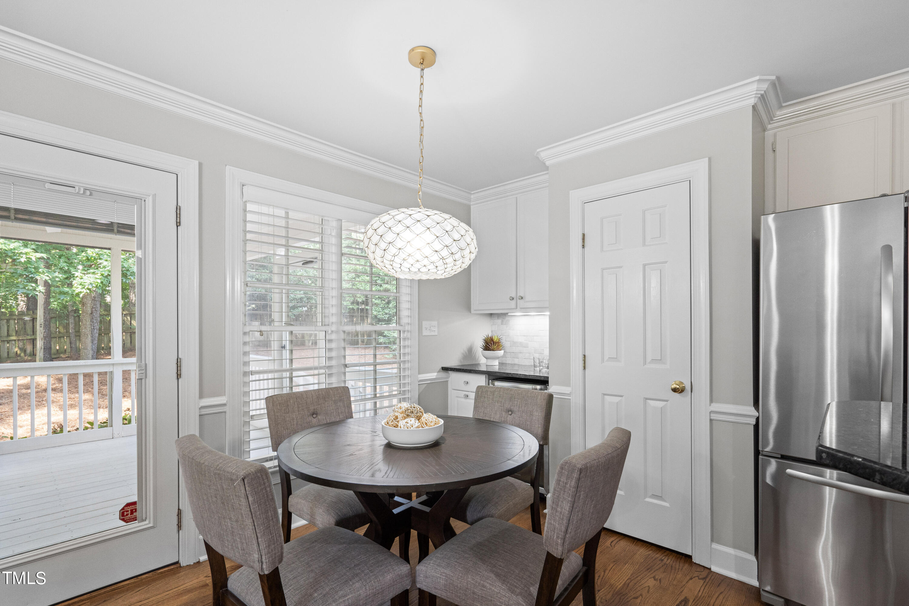 2917 Dahlgreen Road Raleigh, NC 27615 - Photo 10 of 36 a view of a dining room with furniture window and wooden floor
