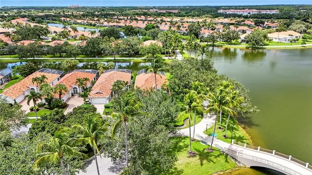 a view of a swimming pool with a patio and a garden
