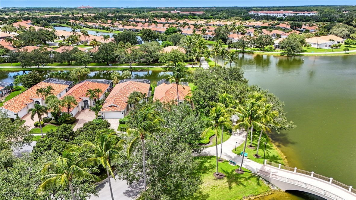 4017 Isla Ciudad Court Naples, FL 34109 - Photo 29 of 36 an aerial view of river residential houses with outdoor space