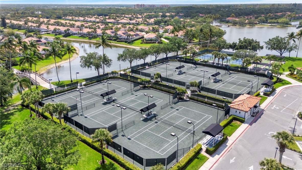 4017 Isla Ciudad Court Naples, FL 34109 - Photo 33 of 36 an aerial view of a city with lots of residential buildings