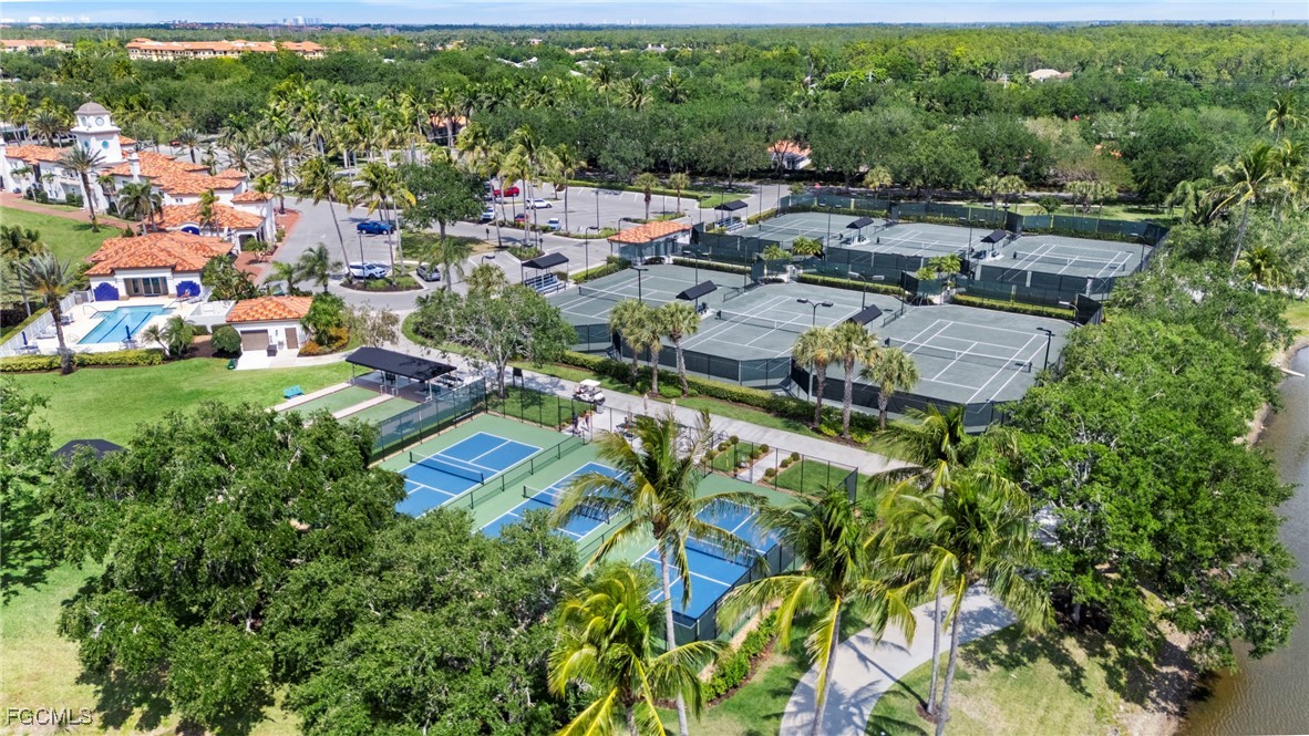 4017 Isla Ciudad Court Naples, FL 34109 - Photo 34 of 36 an aerial view of a house with a yard