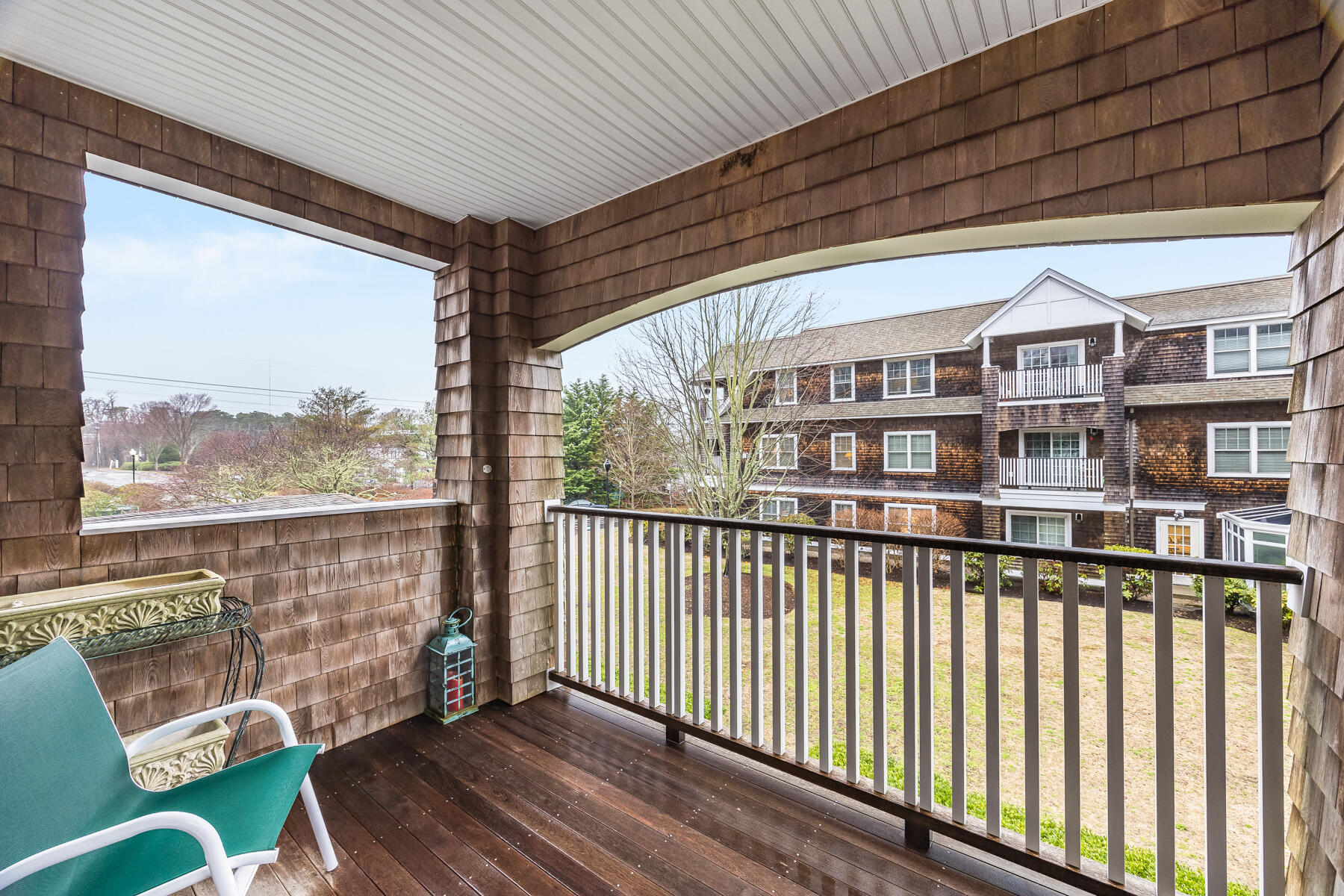 18 West Road, Unit 215 Orleans, MA 02653 - Photo 7 of 21 Side Balcony View