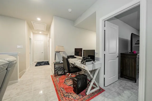 a room with furniture and a flat screen tv