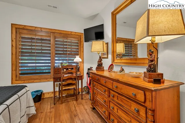 a view of a living room and dining room