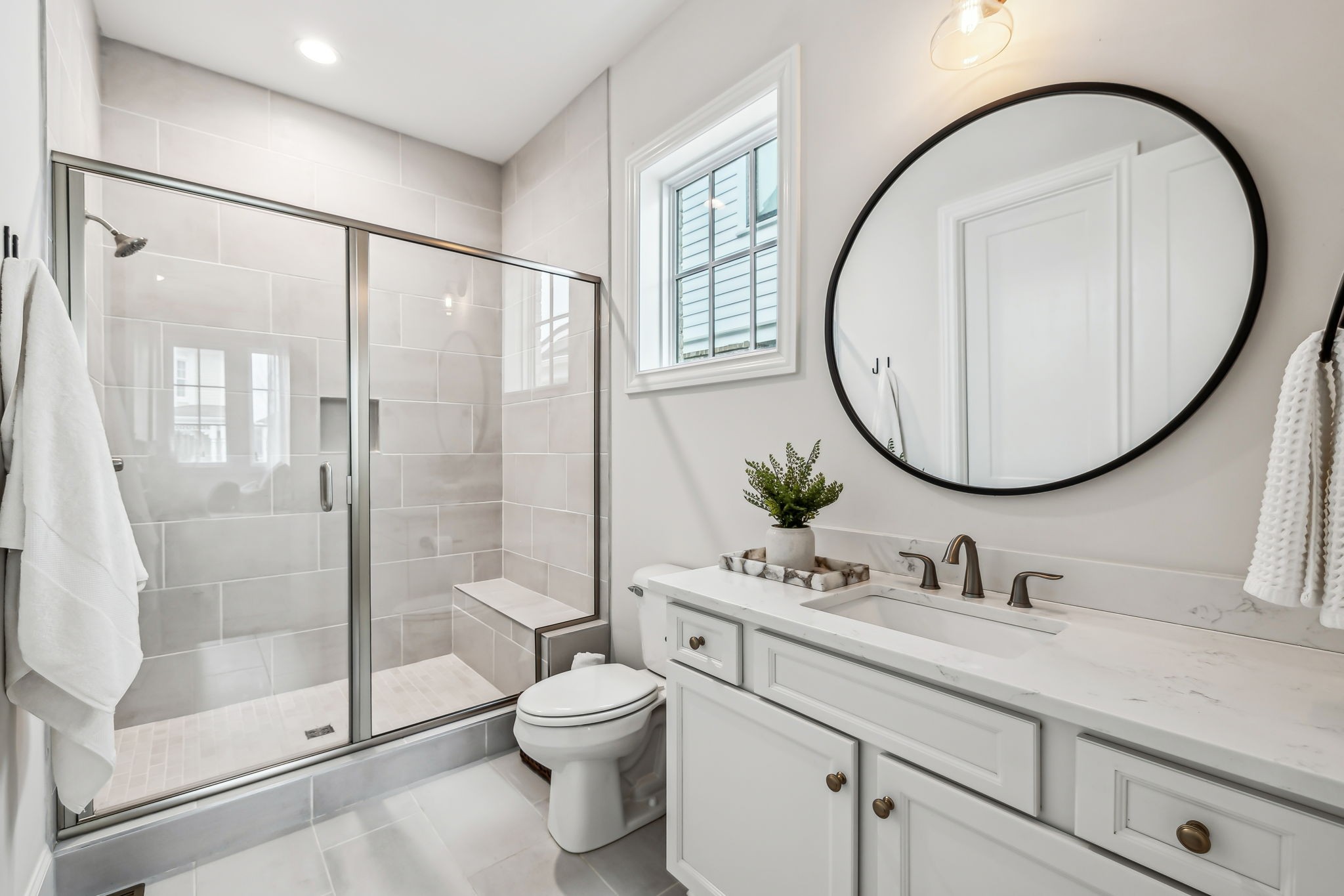 1221 Luckett Road Nashville, TN 37221 - Photo 12 of 59 a bathroom with a granite countertop sink mirror vanity and toilet