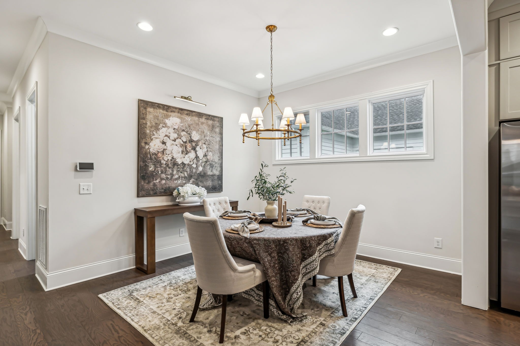 1221 Luckett Road Nashville, TN 37221 - Photo 24 of 59 a view of a dining room with furniture window and wooden floor