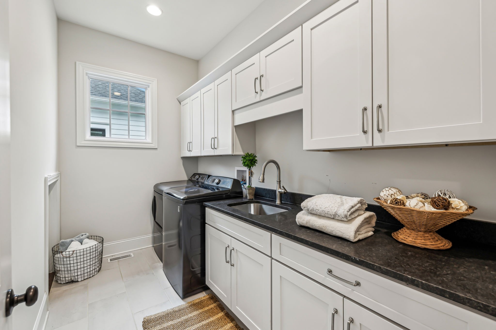 1221 Luckett Road Nashville, TN 37221 - Photo 27 of 59 a kitchen with stainless steel appliances granite countertop a sink dishwasher stove and cabinets