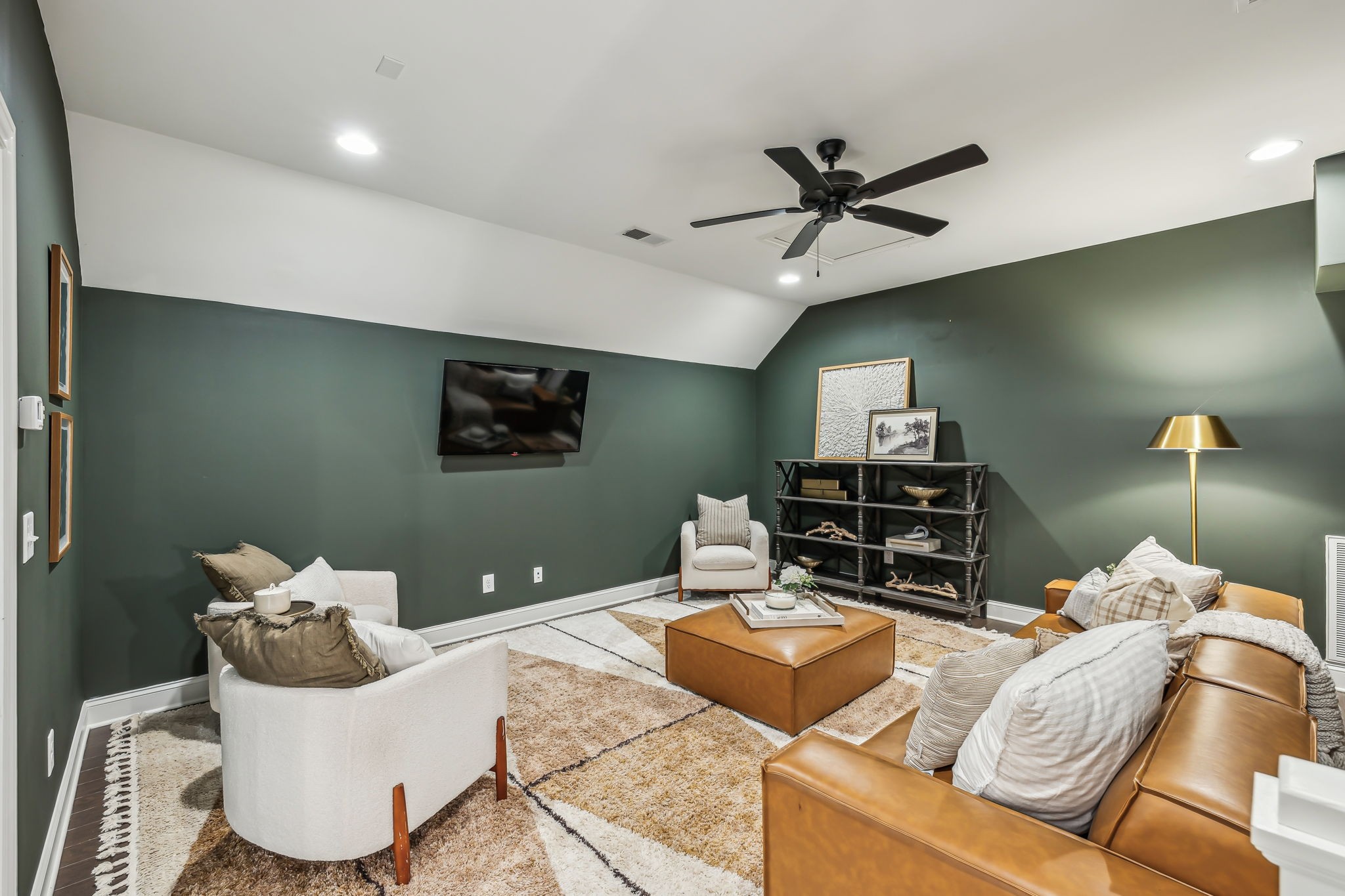 1221 Luckett Road Nashville, TN 37221 - Photo 35 of 59 a living room with furniture and a flat screen tv