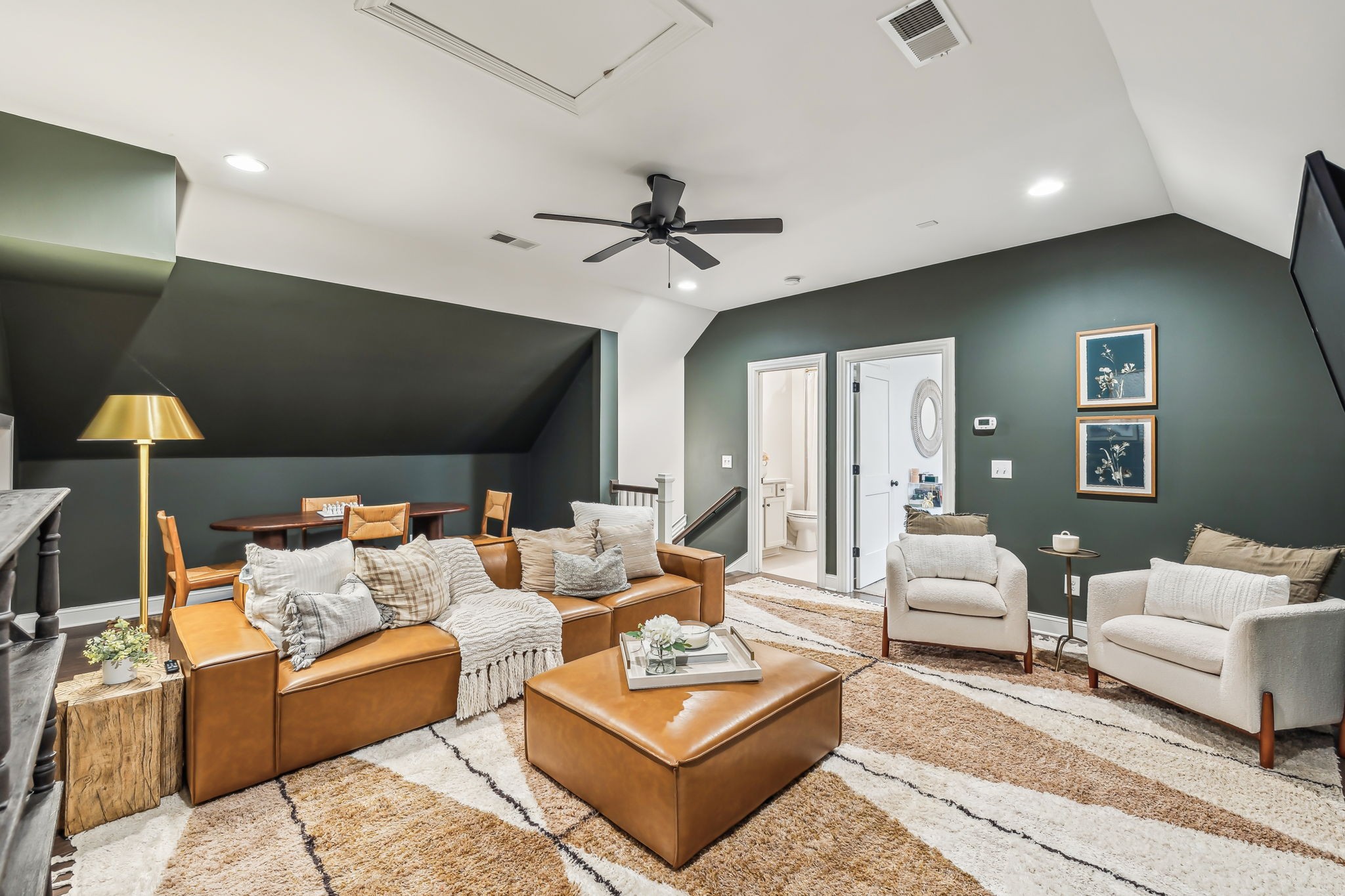 1221 Luckett Road Nashville, TN 37221 - Photo 37 of 59 a living room with furniture and a chandelier