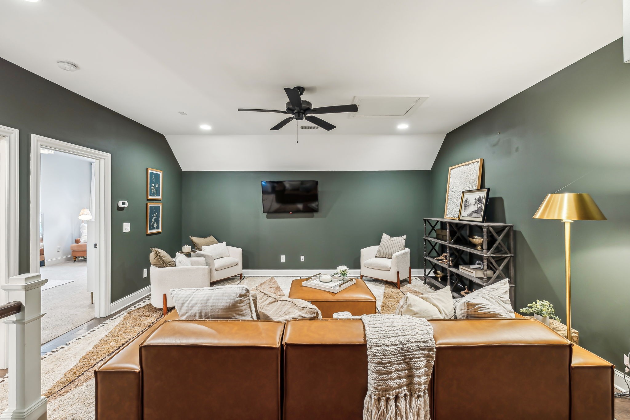 1221 Luckett Road Nashville, TN 37221 - Photo 38 of 59 a bedroom with furniture and a chandelier