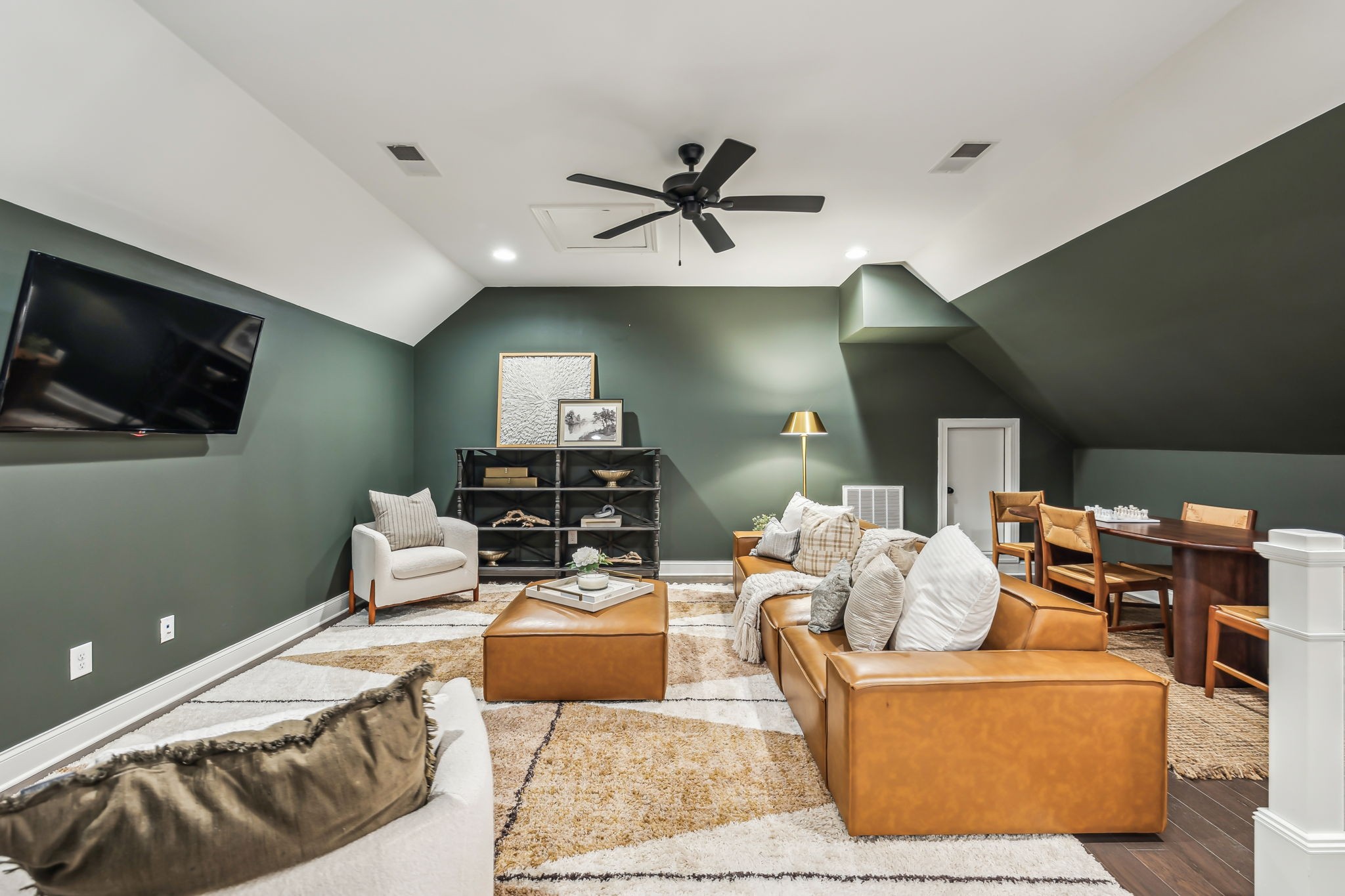 1221 Luckett Road Nashville, TN 37221 - Photo 40 of 59 a living room with furniture and a flat screen tv