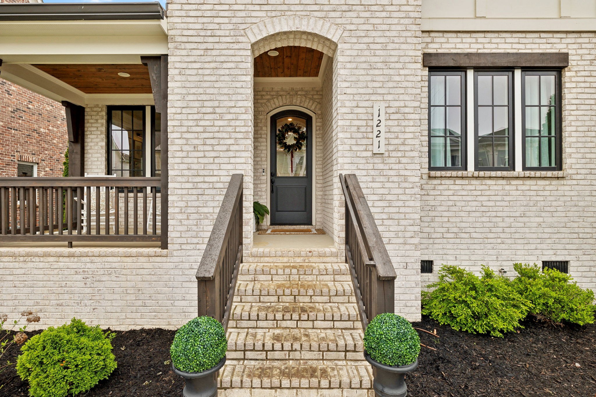 1221 Luckett Road Nashville, TN 37221 - Photo 4 of 59 a front view of a house