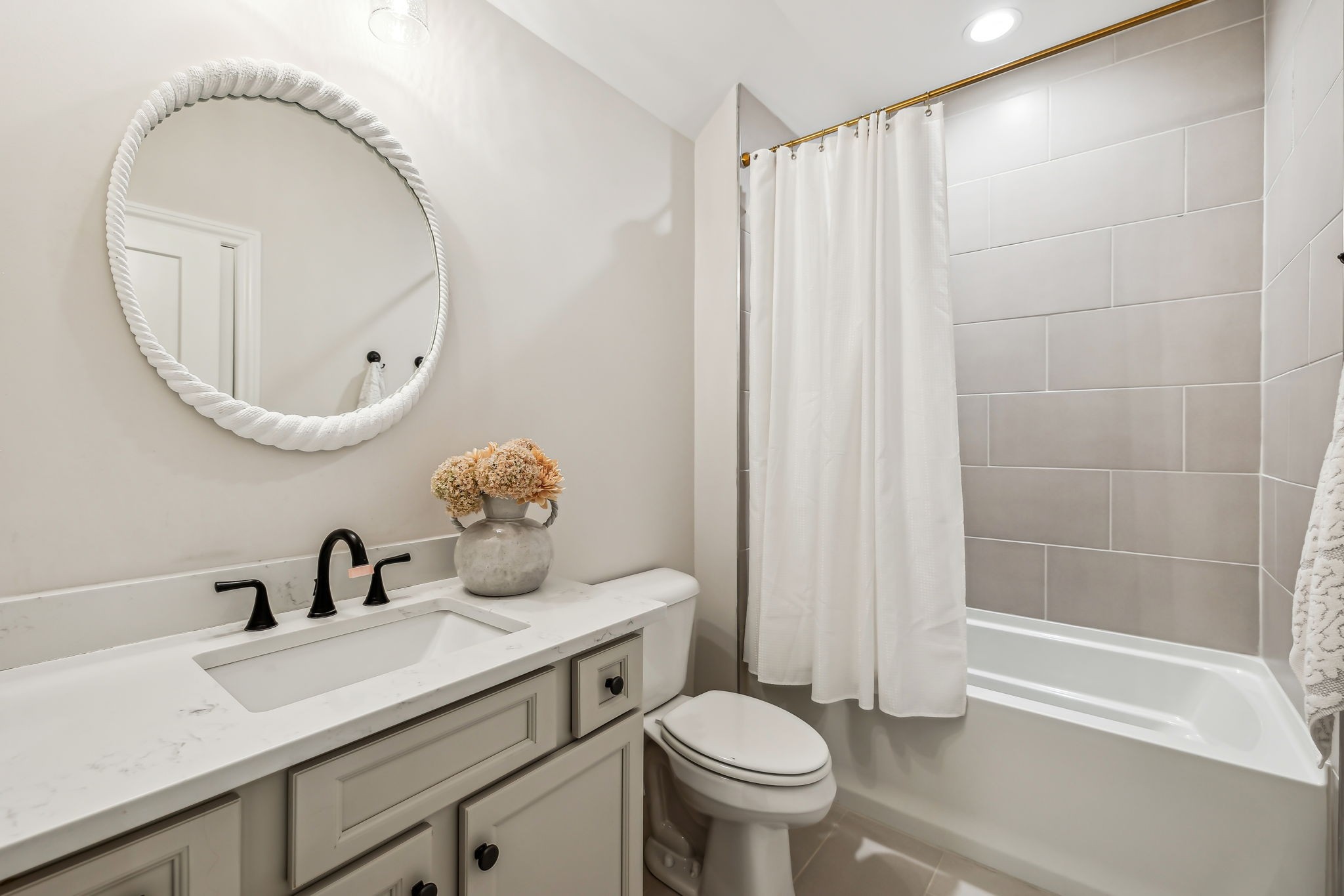 1221 Luckett Road Nashville, TN 37221 - Photo 43 of 59 a bathroom with a sink a toilet and shower