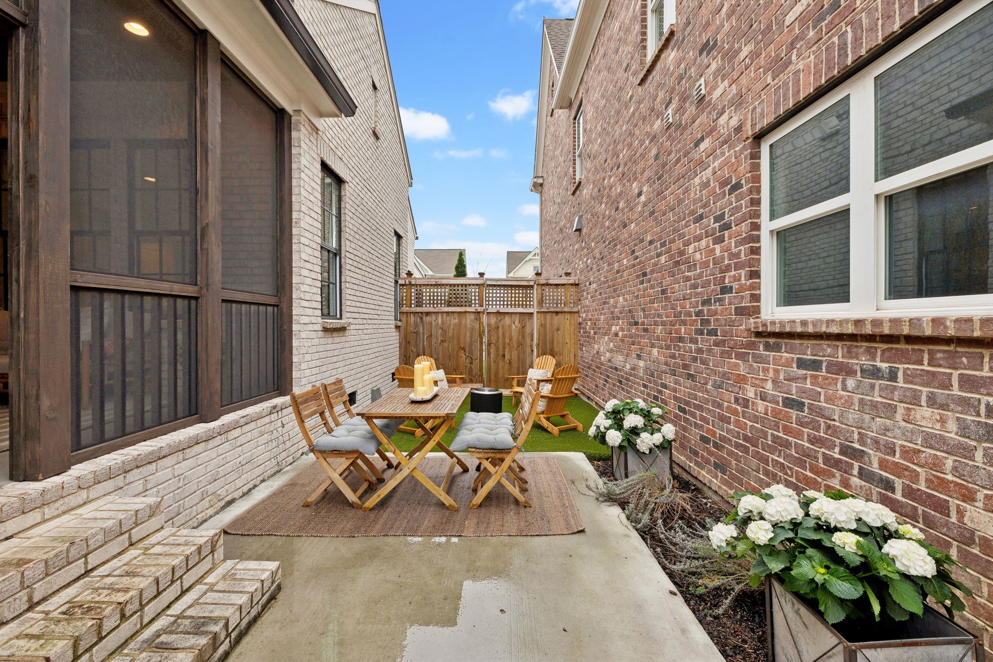 1221 Luckett Road Nashville, TN 37221 - Photo 46 of 59 a view of a patio with couple of chairs and couch