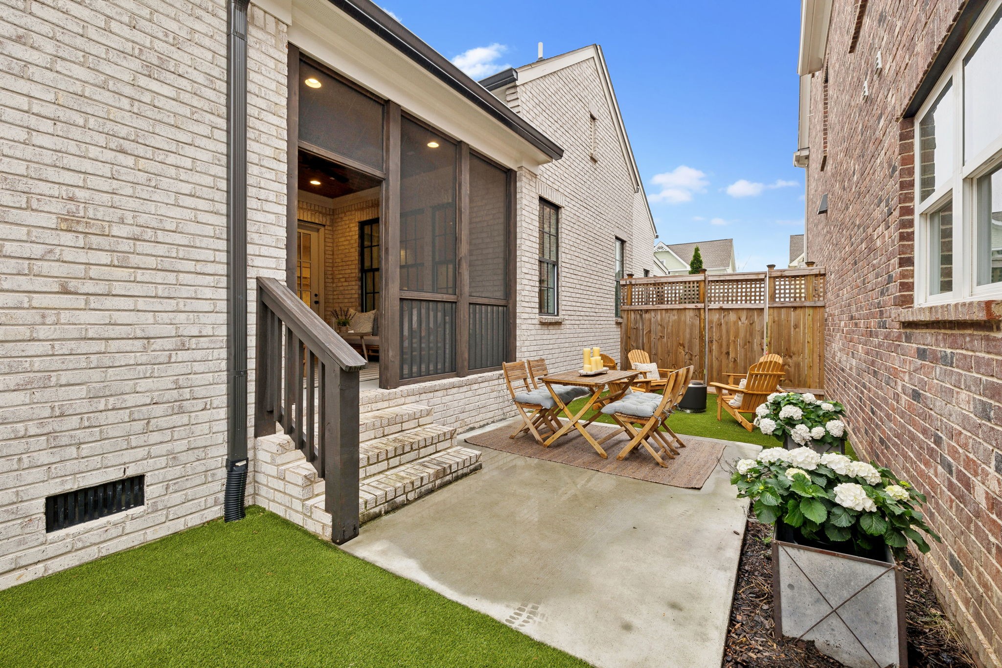 1221 Luckett Road Nashville, TN 37221 - Photo 49 of 59 a view of a patio with couches and a fire pit