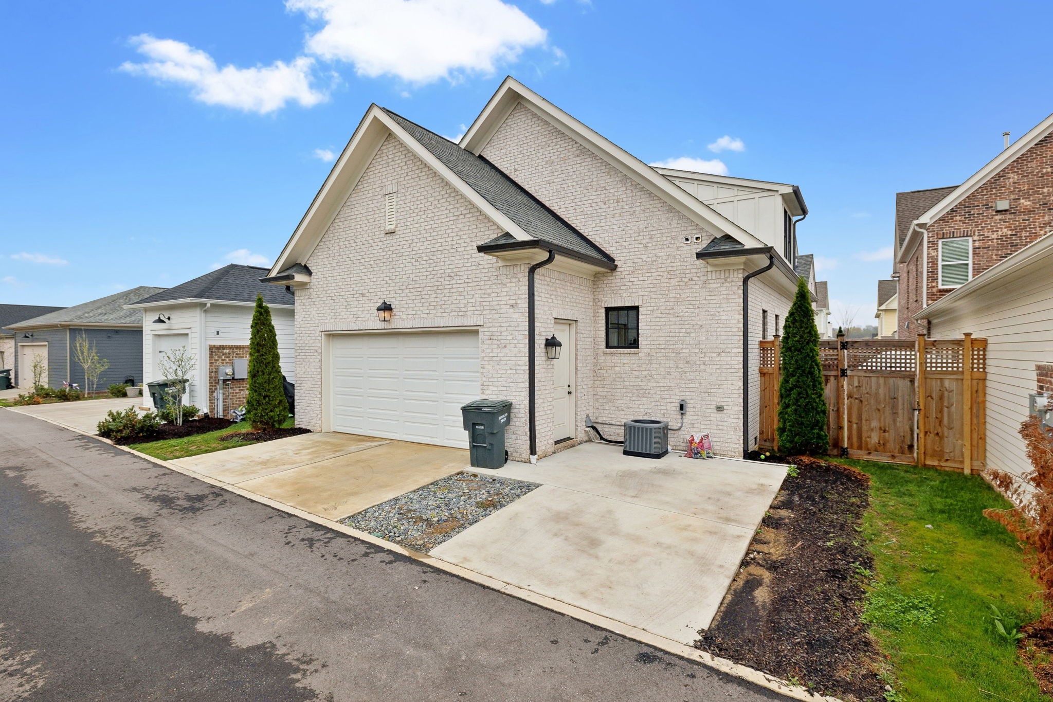 1221 Luckett Road Nashville, TN 37221 - Photo 52 of 59 a view of a white house with a street