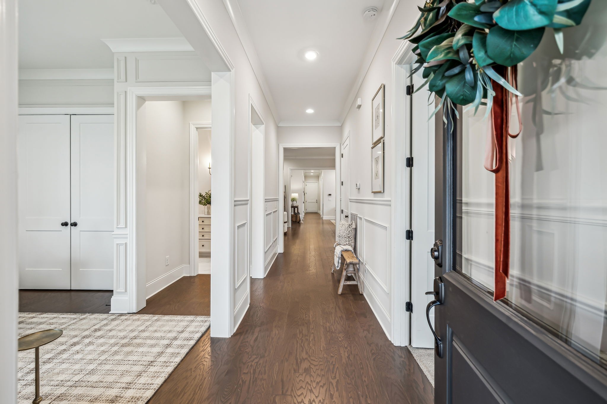 1221 Luckett Road Nashville, TN 37221 - Photo 6 of 59 a view of a hallway with wooden floor and staircase