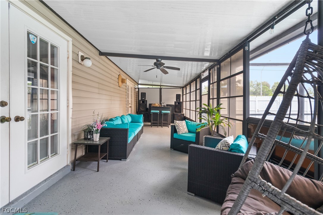 32 Lincoln Avenue Lehigh Acres, FL 33936 - Photo 21 of 32 a living room with furniture and a window