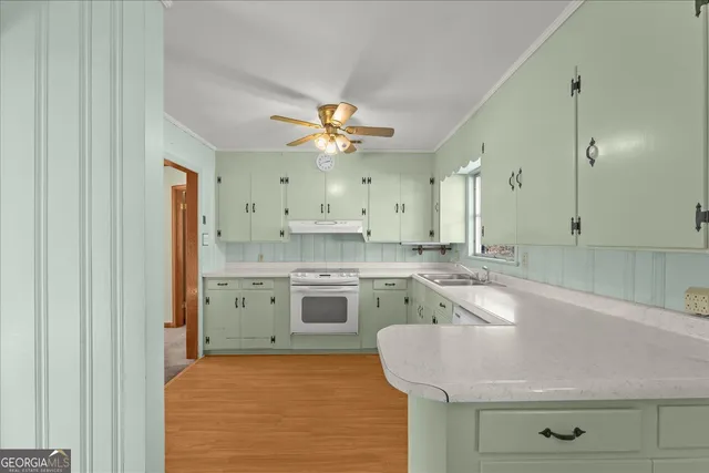 a room with a white cabinets and sink