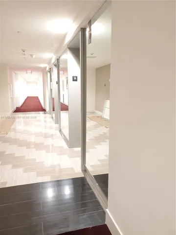 a view of washer and dryer sitting in a room