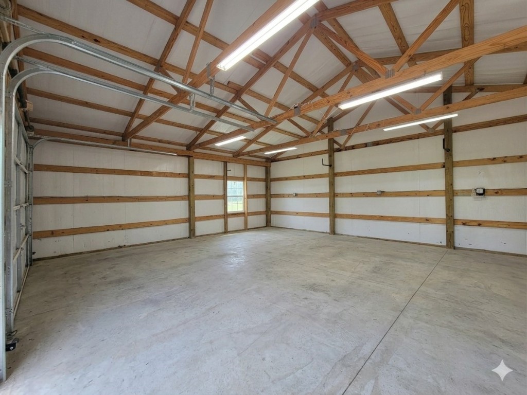130 Cedar Court Magnolia, TX 77355 - Photo 20 of 26 Inside of workshop. (photo edited by Gemini to remove contents inside)