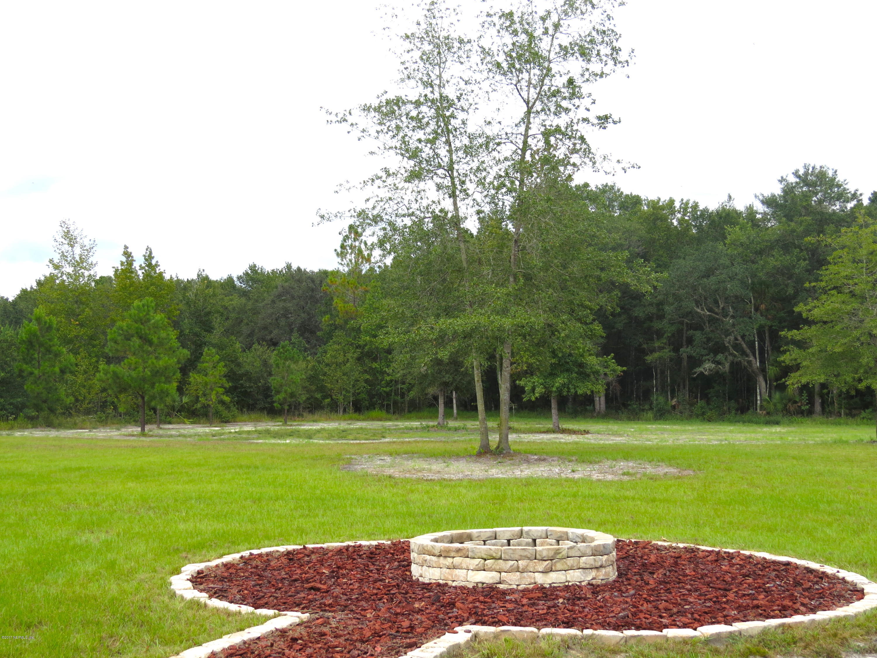 55051 Countree Life Way Hilliard, FL 32046 - Photo 6 of 22 backyard fire pit