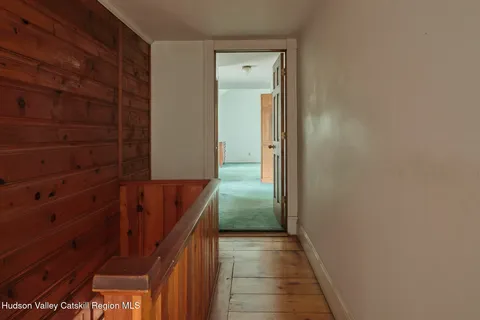 a bathroom with a sink a mirror and a shower