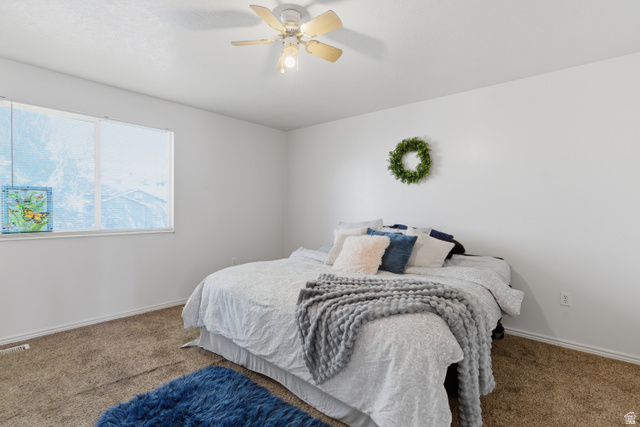 134 West 475 South Ogden, UT 84404 - Photo 13 of 27 Bedroom with carpet floors and a ceiling fan
