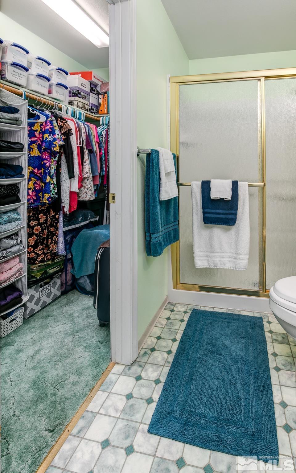 4170 Bottom Road Fallon, NV 89406 - Photo 14 of 38 a view of walk in closet with clothes and shoes