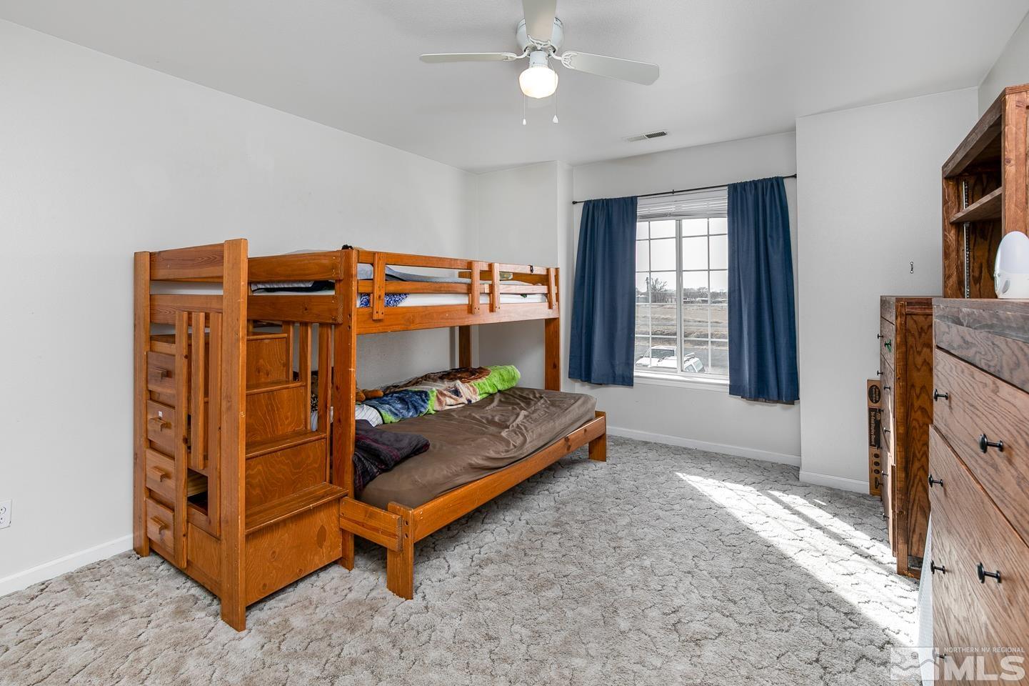 4170 Bottom Road Fallon, NV 89406 - Photo 21 of 38 a bedroom with bed and window