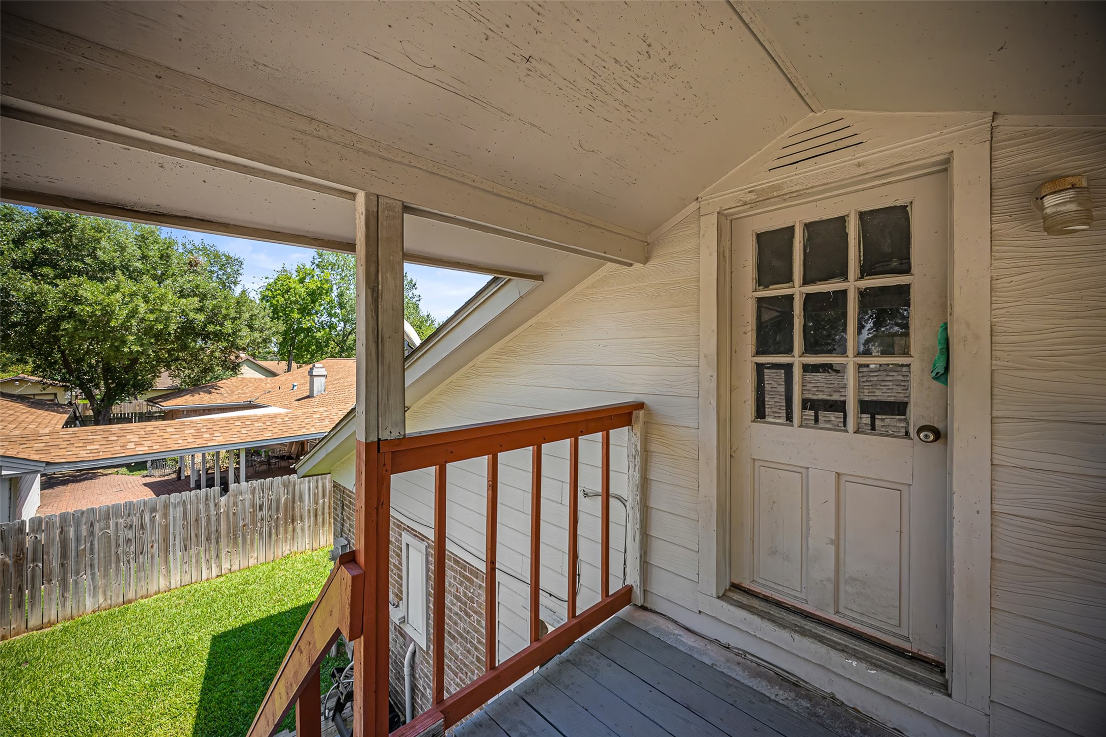 2519 Wood River Road Spring, TX 77373 - Photo 23 of 26 a view of balcony with wooden floor and fence