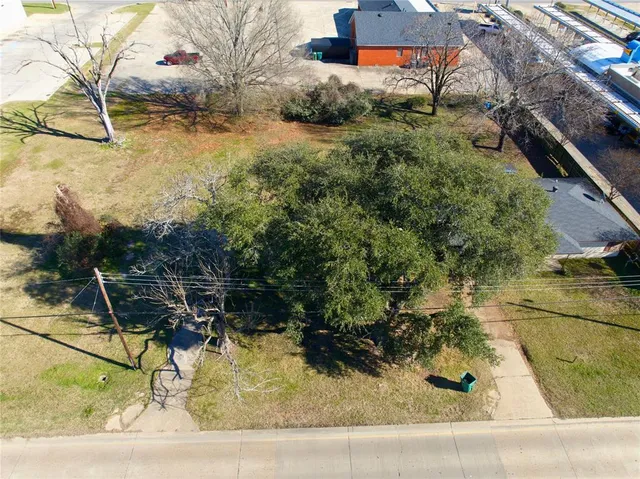 a view of backyard with seating space
