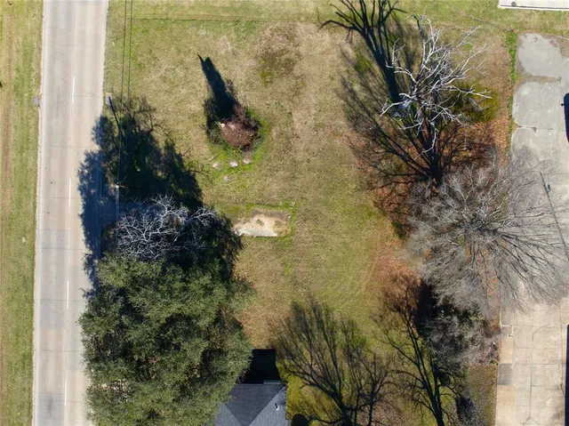 an aerial view of a residential apartment building with a mountain