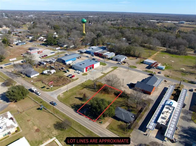 a view of a swimming pool with a yard