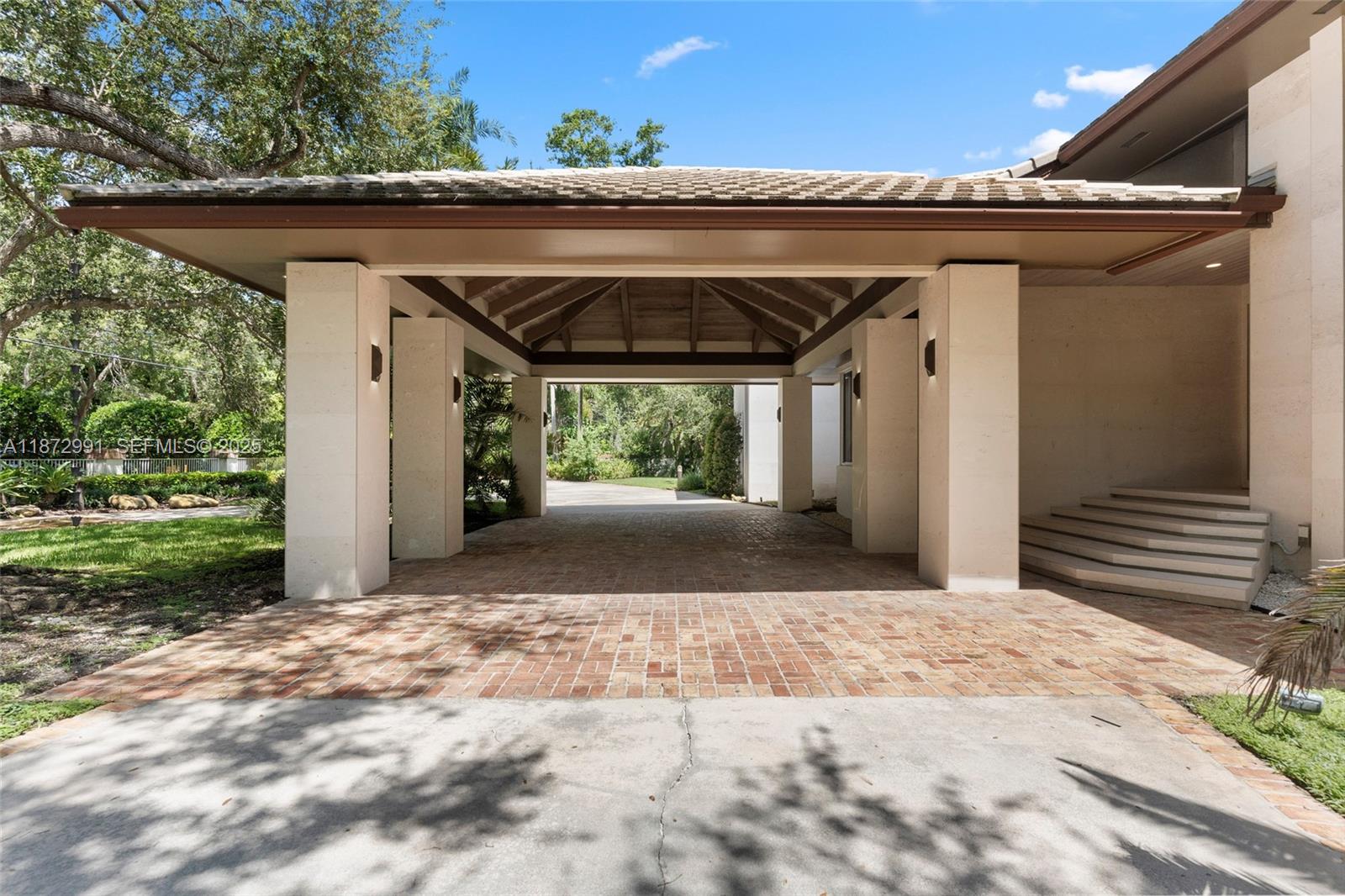 6190 Southwest 102nd Street Pinecrest, FL 33156 - Photo 11 of 52 a view of backyard with seating space