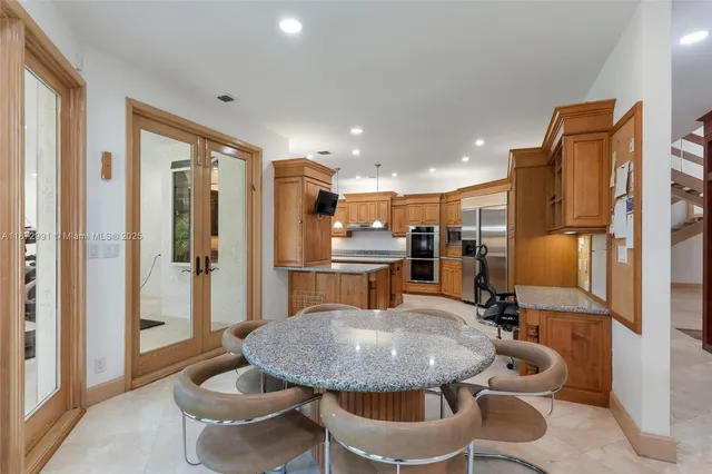 a bedroom with a bed and a mirror