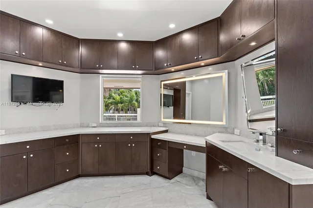 a bathroom with a bathtub and a sink