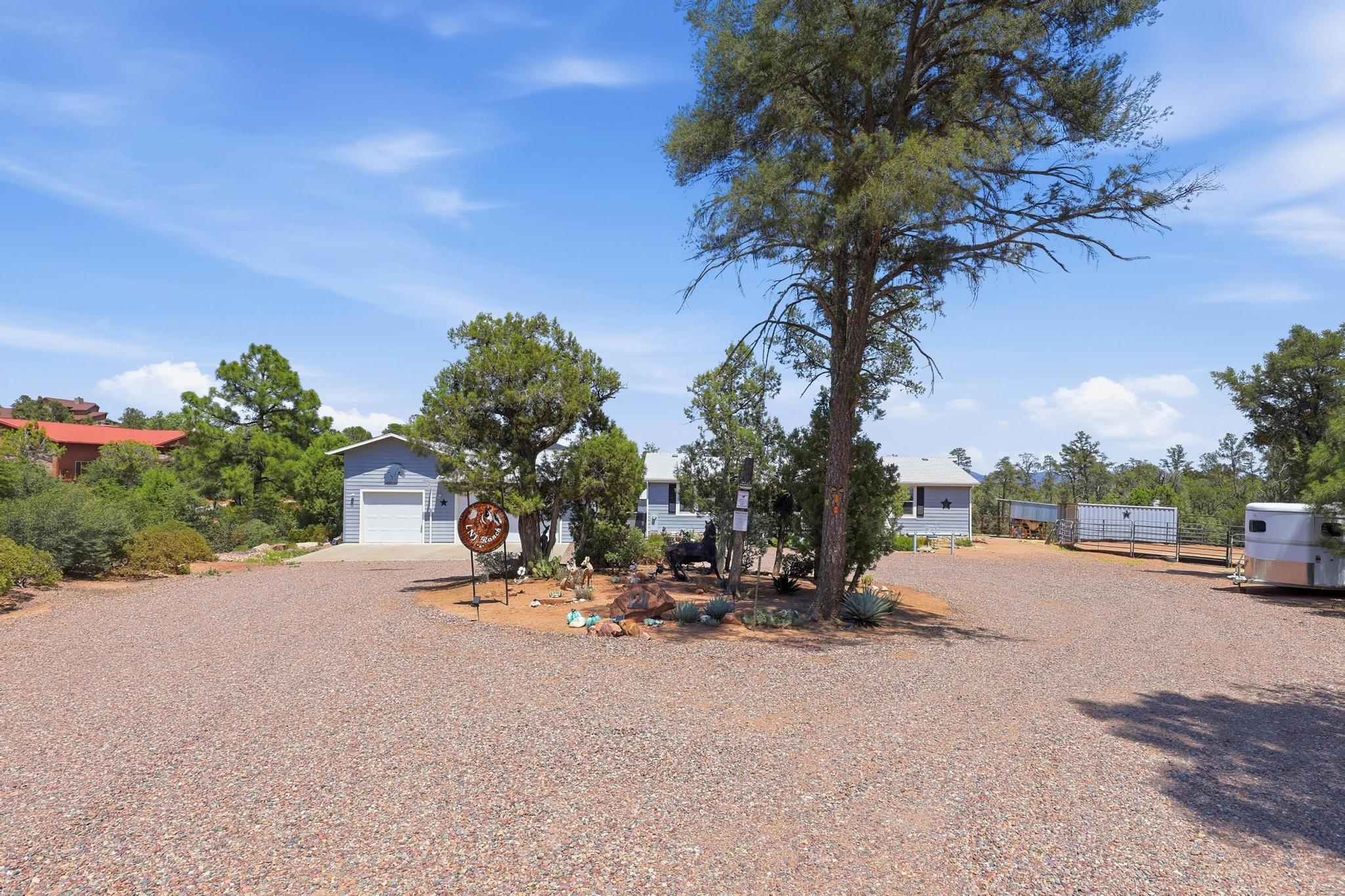 1211 Heather Circle Payson, AZ 85541 - Photo 50 of 51 a view of a street with a bench and a bench in the patio