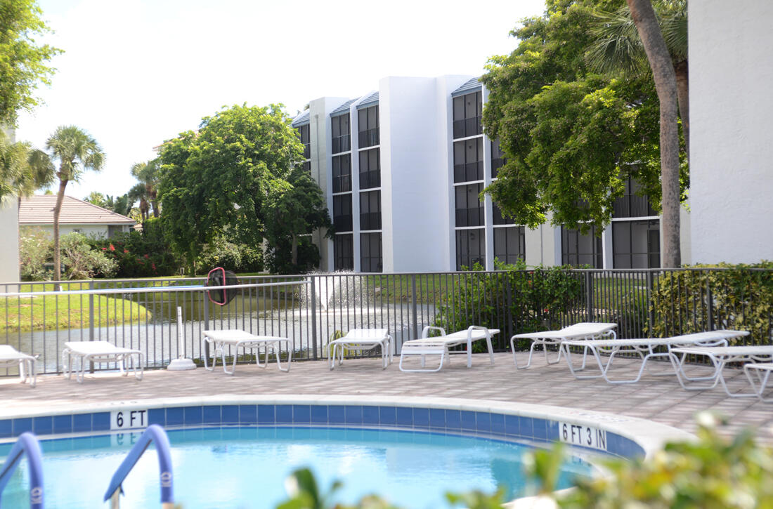 1605 Highway 1, Unit E203 Jupiter, FL 33477 - Photo 27 of 28 Searise Pool Day